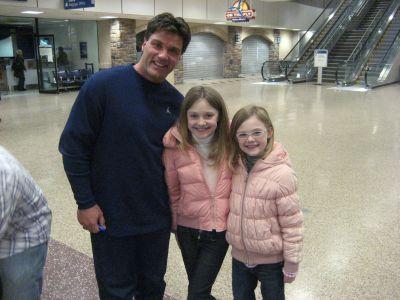 Posing with a fan after arriving for Sundance 2007.

